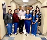 Rosalba Carrera recognized by VC's Bobby Cubriel at the Jackson County Hospital