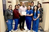 Rosalba Carrera recognized by VC's Bobby Cubriel at the Jackson County Hospital