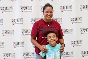 A parent and child smiling at VC STEM Family Night