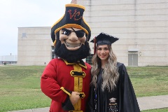 Captain Vic and 2025 graduate