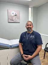 Michael Pfeil Jr smiles at MHK Family Practice