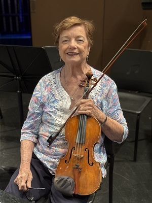 Nina Mavrinac holds her violin